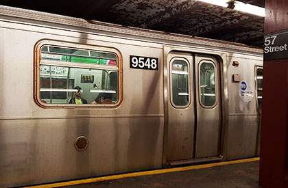 F Train in the station at 57th street